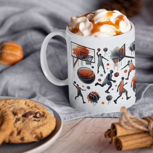 White ceramic coffee mug (11oz) featuring vibrant basketball-themed designs, perfect for sports enthusiasts. Safe for use in microwaves and dishwashers, BPA and lead-free.